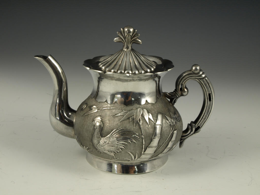 Appraisal: Chinese Export Silver Teapot pear form body with chased rooster