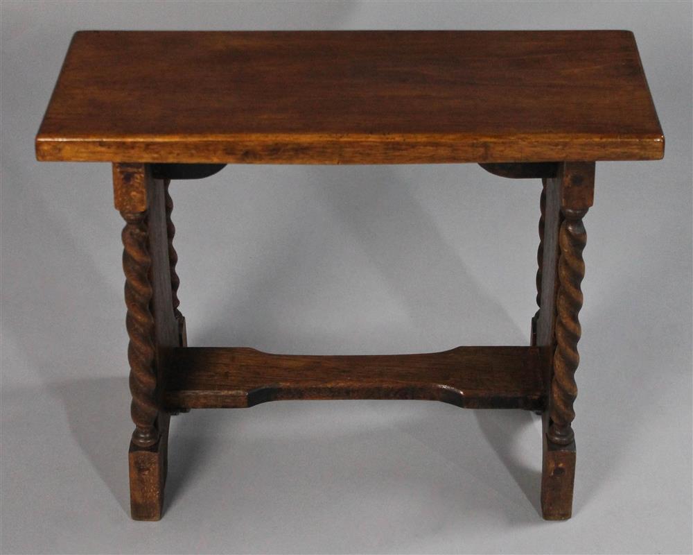 Appraisal: BAROQUE STYLE OAK TRESTLE BENCH having a rectangular top raised