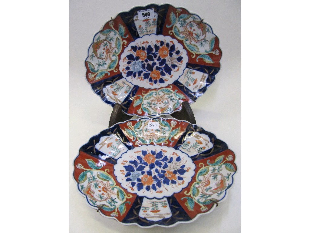 Appraisal: Pair of Imari oval plates with scalloped rims