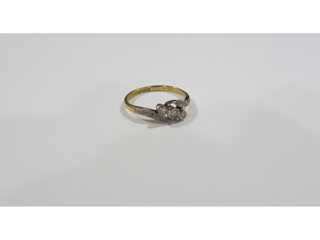 Appraisal: 's eighteen carat gold diamond three stone twist ring