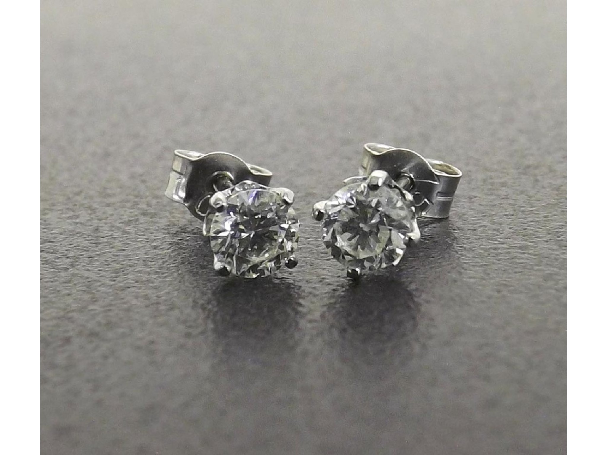 Appraisal: Pair of ct white gold diamond ear studs round brilliant-cuts