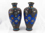 Appraisal: A pair of cloisonne enamelled vases ht cm dents