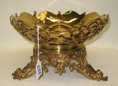 Appraisal: GILT METAL AND BRASS FRUIT BOWL on attached baroque style