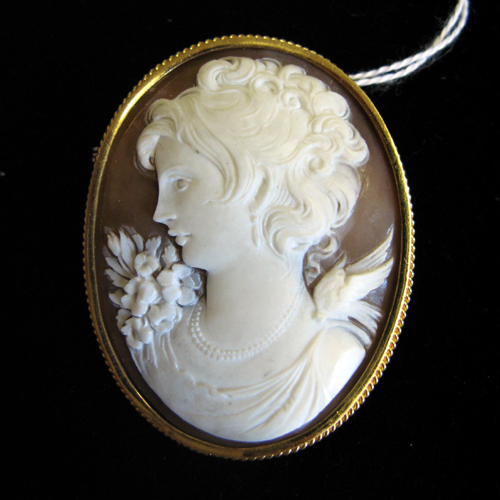 Appraisal: VICTORIAN CAMEO BROOCH an oval portrait of a young woman