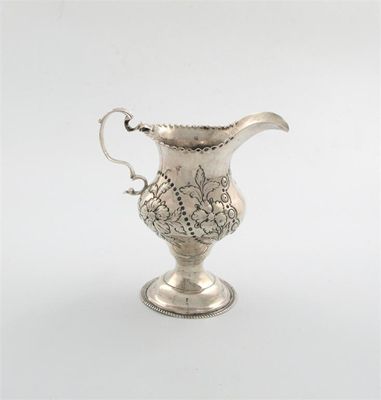 Appraisal: A George III silver cream jug by Hester Bateman London