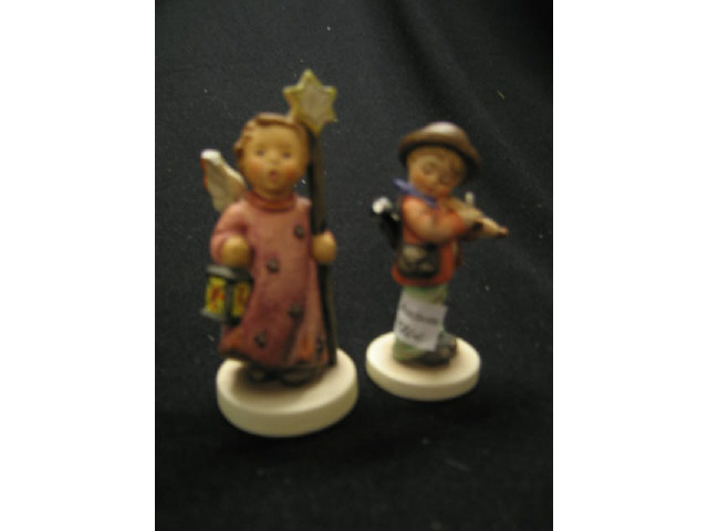 Appraisal: Hummel Figurines Little Fiddler Christmas Song both TMK- both damaged