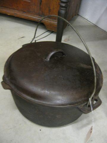 Appraisal: Cast Iron Fireplate Covered Pot diameter