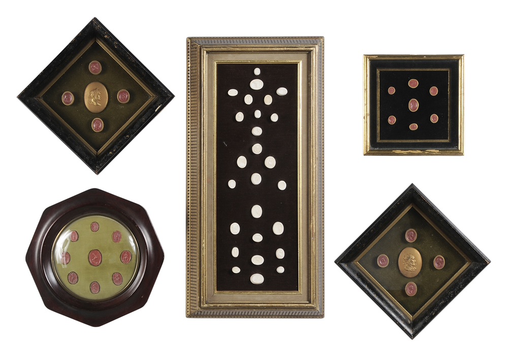 Appraisal: Five Framed Groups of Wax and Ceramic Seal Plaques Continental