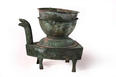 Appraisal: A Han dynasty bronze stove in five pieces the four