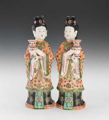 Appraisal: A Pair of Famille Rose Maiden Figures A pair of