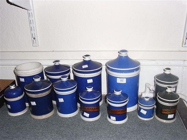 Appraisal: A COLLECTION OF TH CENTURY BLUE POTTERY CYLINDRICAL APOTHECARY JARS