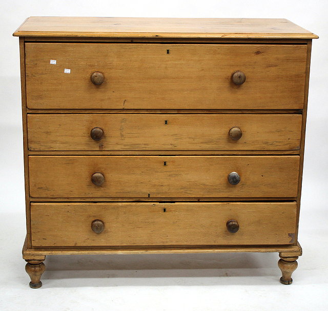 Appraisal: A LARGE VICTORIAN PINE CHEST OF FOUR LONG DRAWERS with