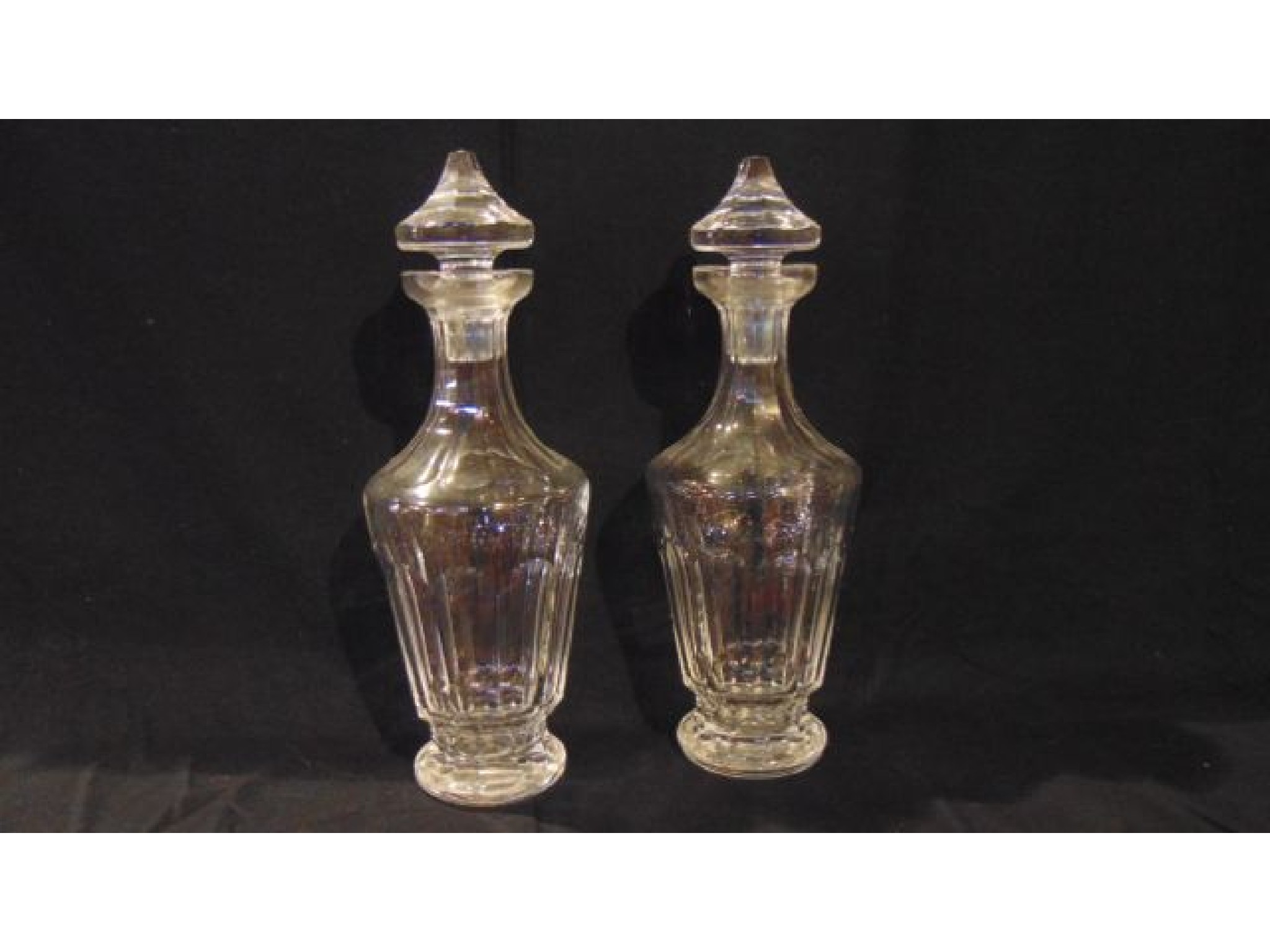 Appraisal: A pair of Waterford crystal decanters with slice cut detail