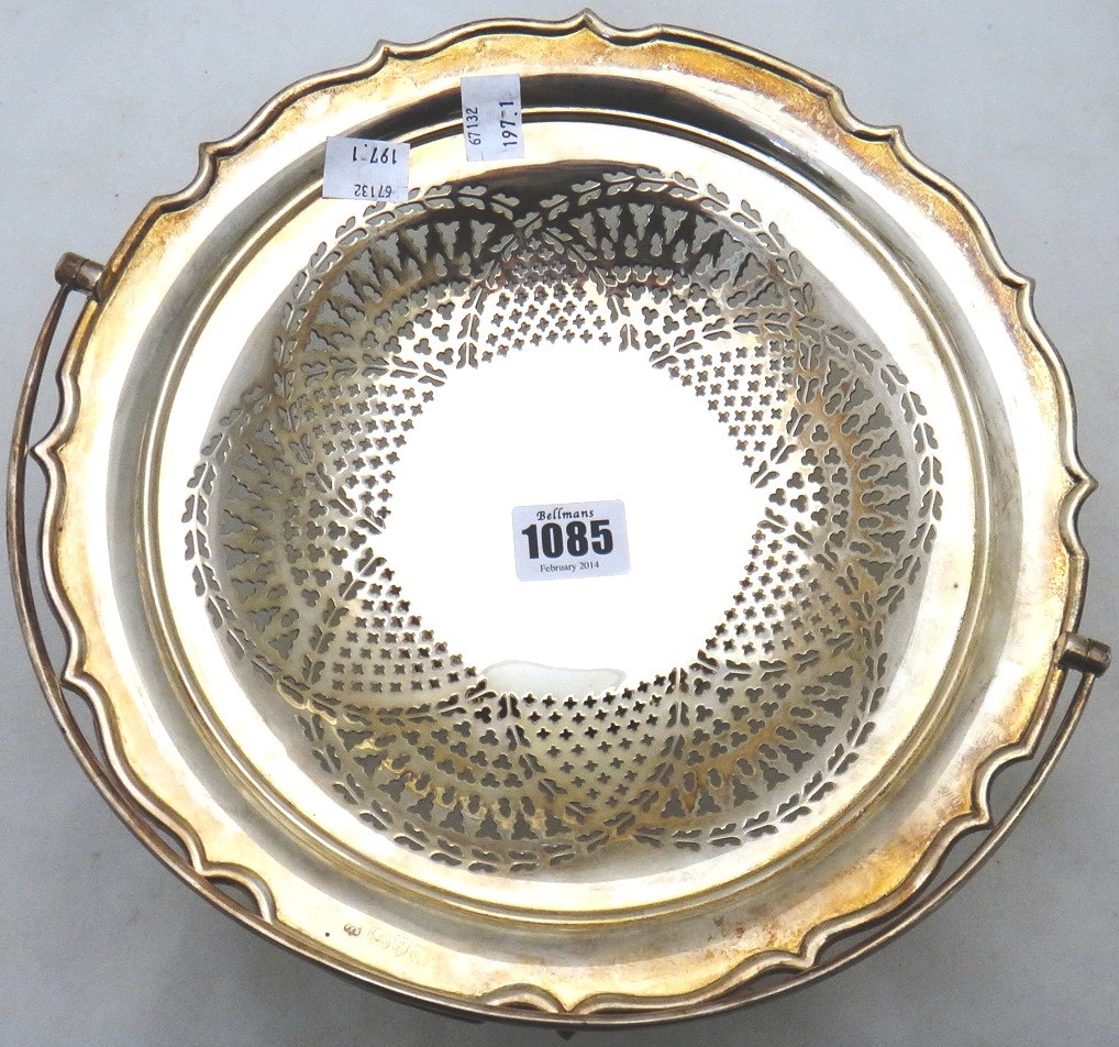 Appraisal: A silver cake basket of shaped circular form with pierced