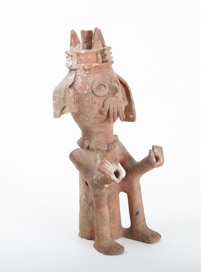 Appraisal: MIXTEC TYPE POTTERY FIGURE OF A SEATED TLALOC The crowned