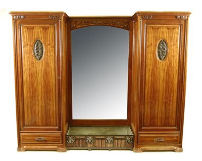 Appraisal: Louis Majorelle A carved mahogany kingwood and wrought iron mounted