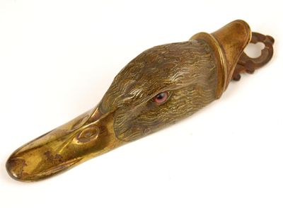 Appraisal: A cold painted brass duck head clip for bills in