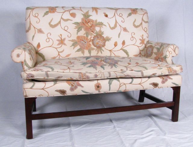 Appraisal: Baker Furniture Chippendale style upholstered settee with floral motif embroidered