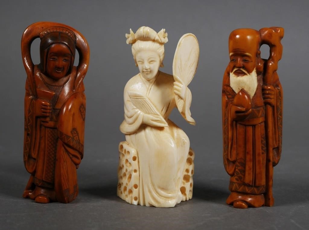 Appraisal: Three vintage ivory carved people including an old woman and