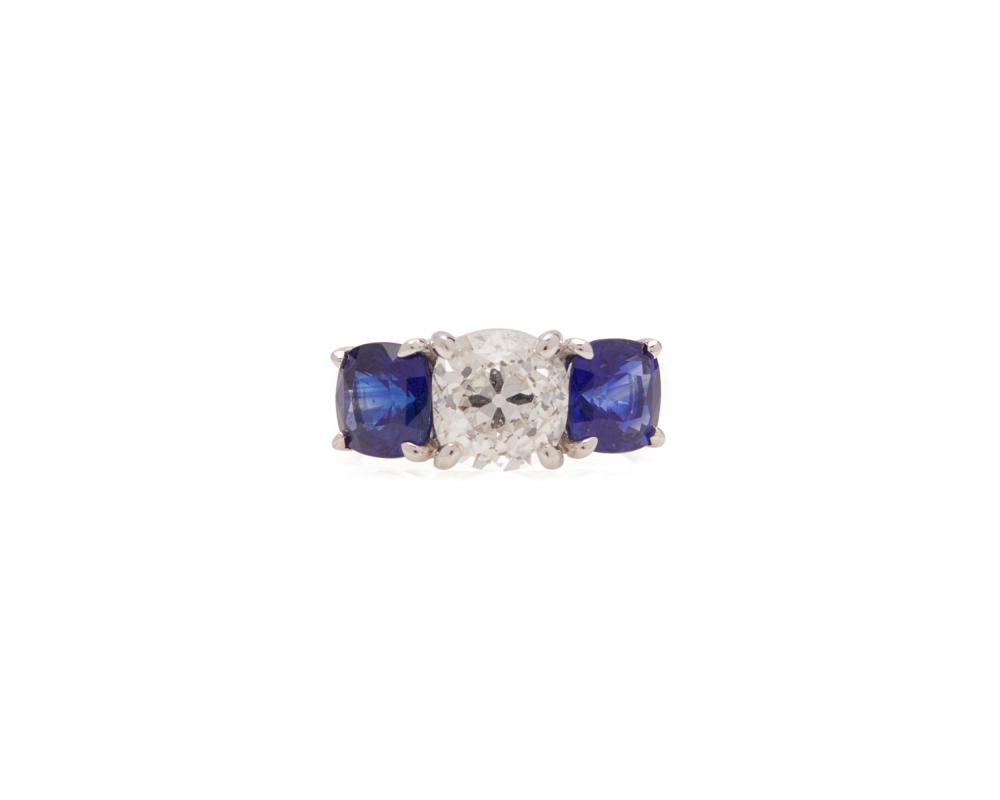 Appraisal: Platinum Diamond and Sapphire Ring centering a cushion brilliant-cut diamond