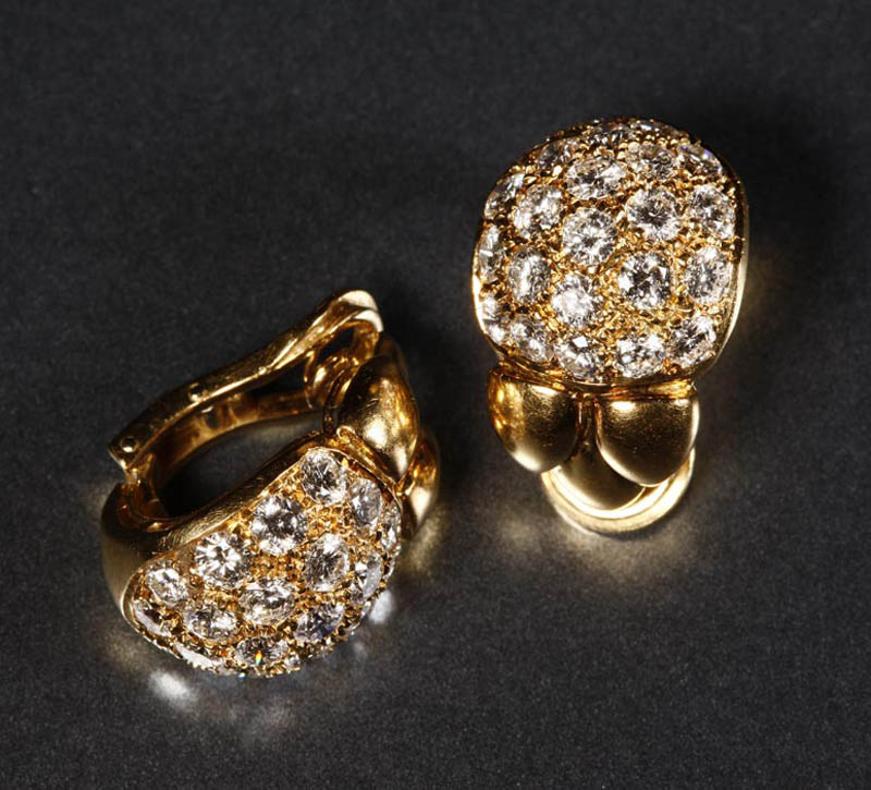 Appraisal: A pair of gold and diamond ear clips A pair