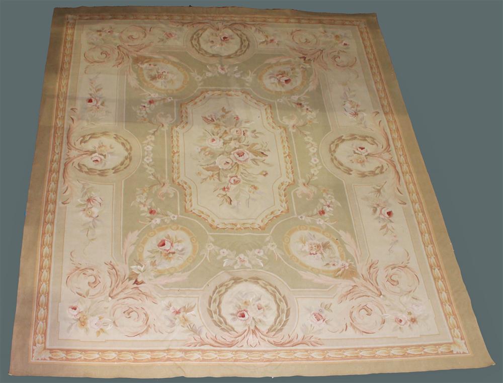 Appraisal: LARGE CHINESE AUBUSSON WOOL RUG flatwoven having a floral center