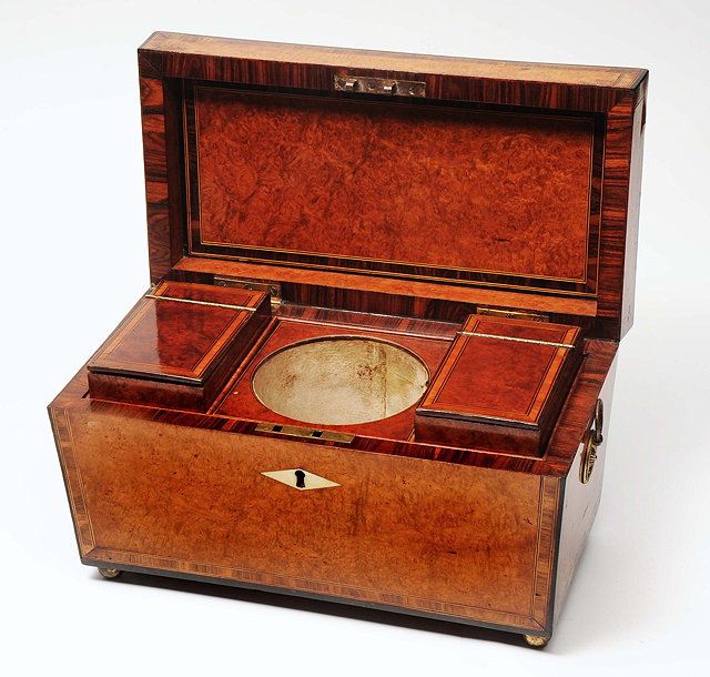 Appraisal: A REGENCY BURLE WALNUT AND ROSEWOOD CROSSBANDED TEA CADDY of