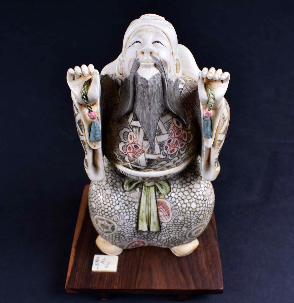 Appraisal: WHIMISCAL JAPANESE OKIMONO OF A MAN WITH TURTLE SHELLMeiji Period