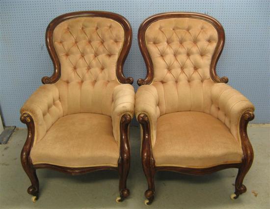 Appraisal: Pair of th Century mahogany framed button back armchairs with