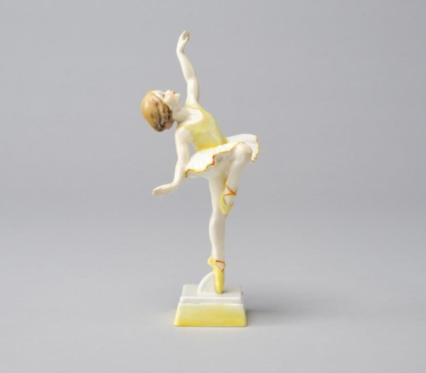 Appraisal: FREDA DOUGHTY FIGURINEA Royal Worcester Tuesday's Child Girl figurine Tuesday's