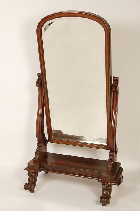 Appraisal: A VICTORIAN MAHOGANY CHEVAL MIRROR the bevelled arch top plate