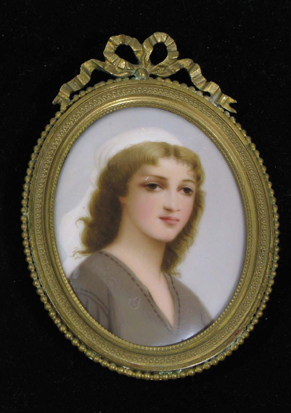 Appraisal: FRENCH SCHOOL MINIATURE OIL ON OVAL PORCELAIN Portrait of young