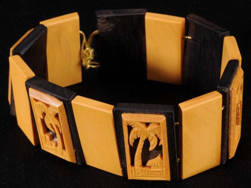 Appraisal: Bakelite Wood Palm Tree Stretch Bracelet Description Would fit most