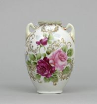 Appraisal: Nippon Bud Vase Sweet double handled porcelain vase features a