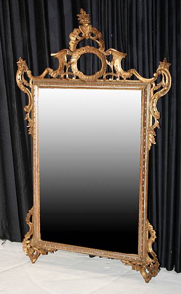 Appraisal: An Italian Rococo style painted and parcel gilt mirror late