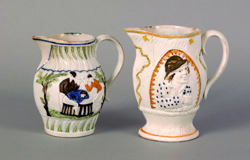 Appraisal: Two Prattware pitchers ca depicting Grooms Carousing h and The