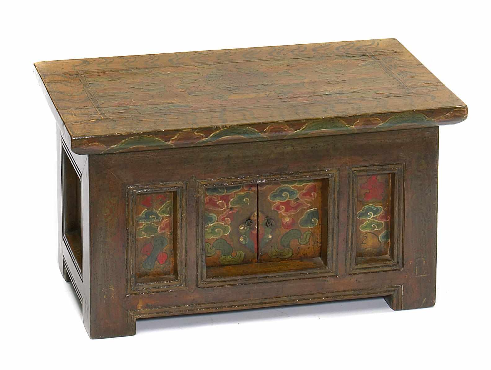 Appraisal: A Tibetan tabletop cabinet shrine height in length in depth