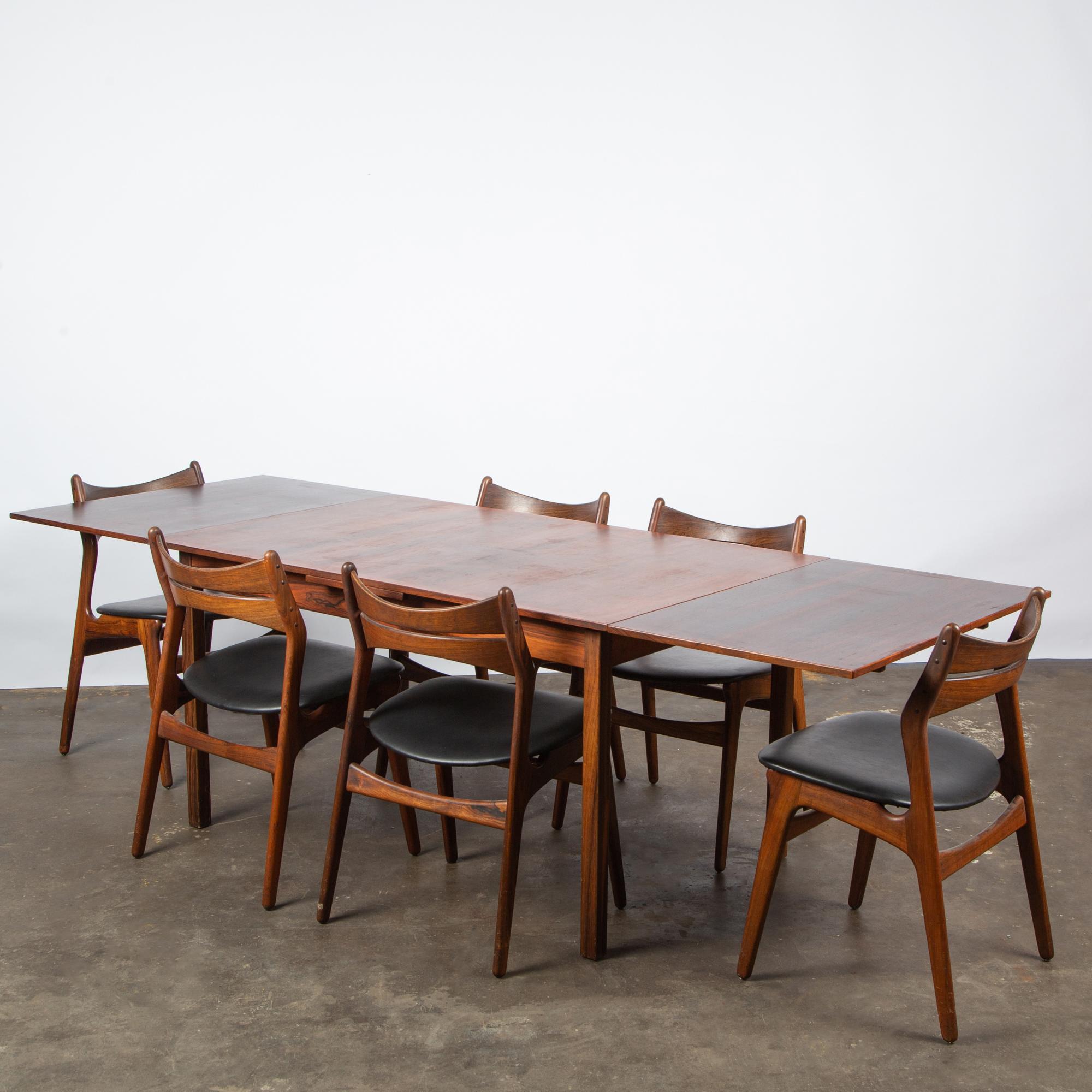 Appraisal: ERIK BUCH DANISH ROSEWOOD TABLE SIX MODEL CHAIRS An Erik