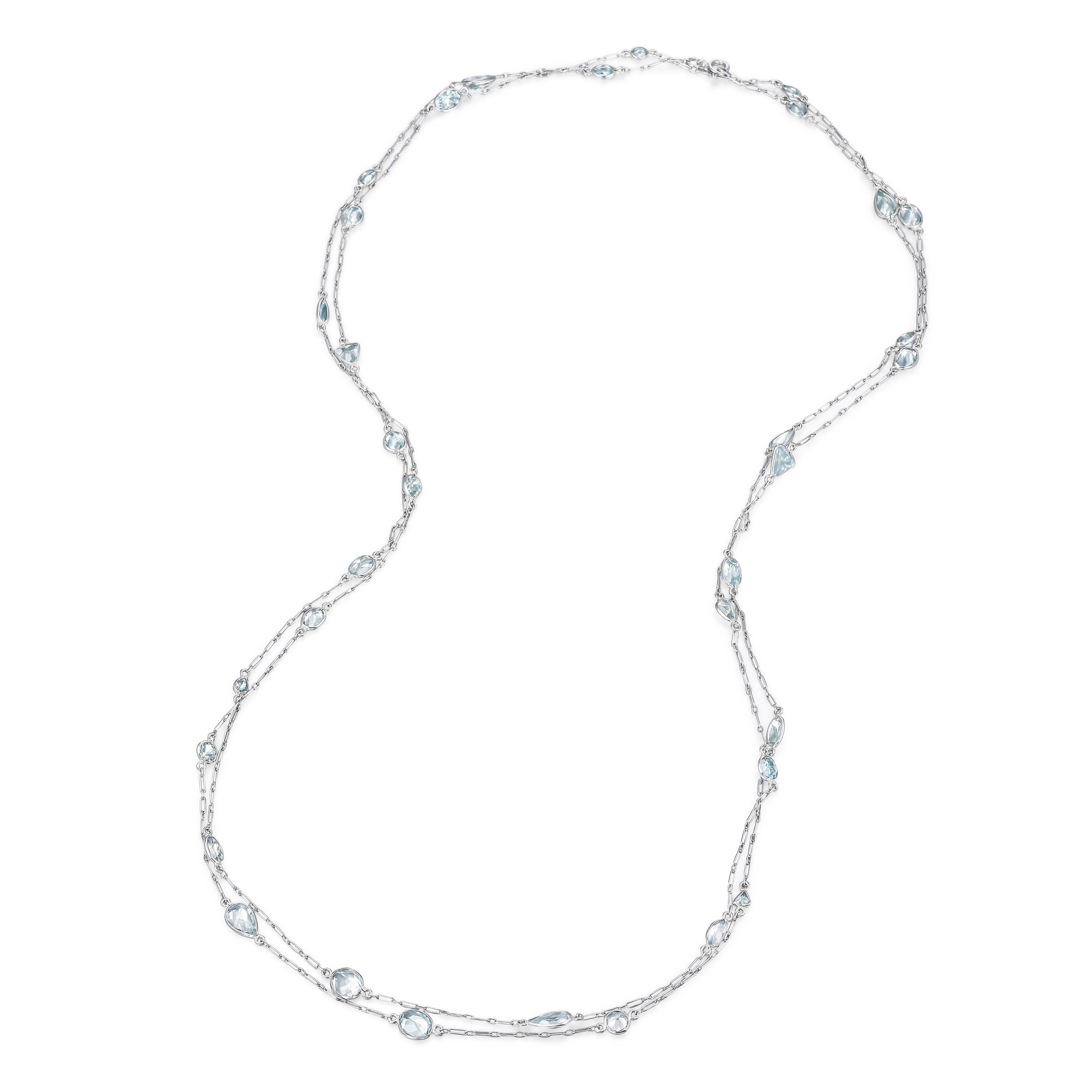 Appraisal: AQUAMARINE LONG STATION NECKLACE METAL platinum GEMSTONE S multi-shaped faceted