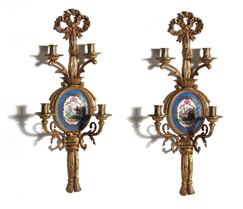 Appraisal: French gilt-bronze wall appliques and candlesticks Louis XVI style porcelain-inset