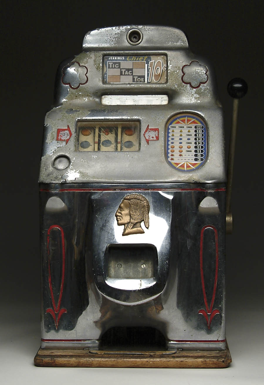 Appraisal: JENNINGS CHIEF INDIAN FRONT SLOT MACHINE Dime slot machine with