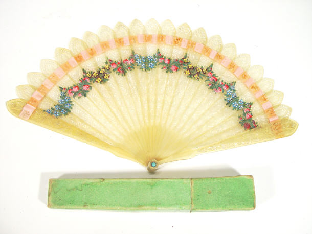 Appraisal: Edwardian pierced composite fan with ribbon and hand painted floral