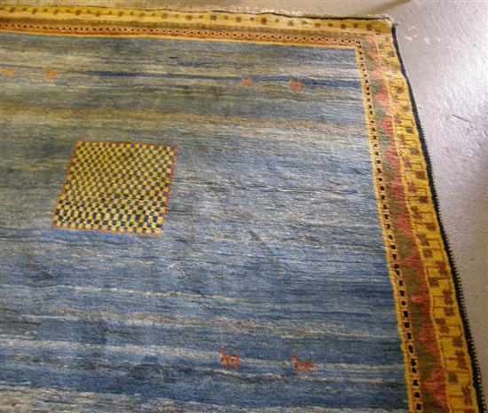 Appraisal: Mexican blue ground rug with multiple yellow borders centred with