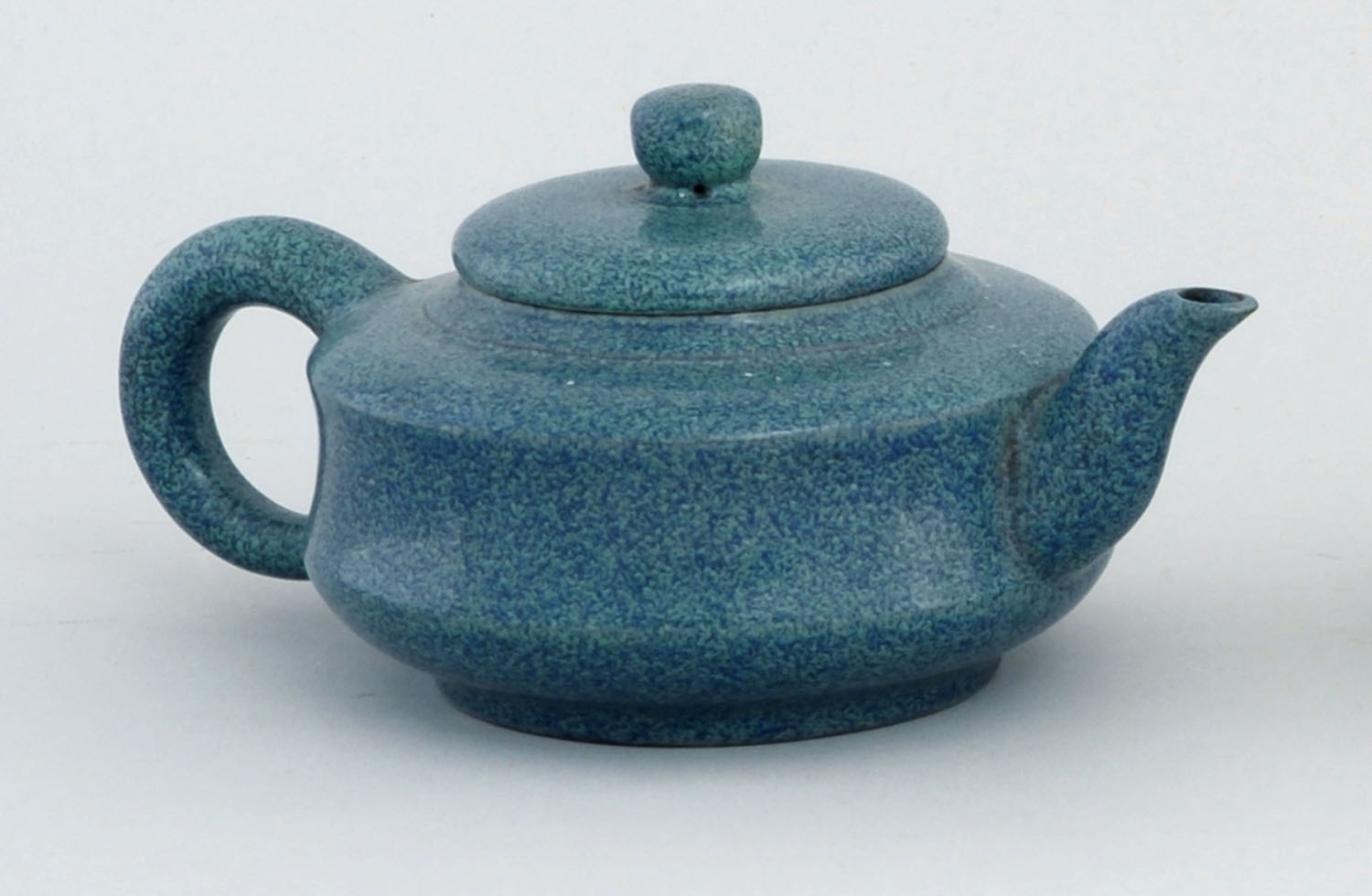 Appraisal: ROBIN'S-EGG BLUE ON YIXING POTTERY TEAPOT In cylinder form Marked