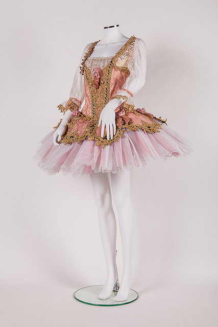 Appraisal: A gold and pink tutu worn by the character Bridesmaid