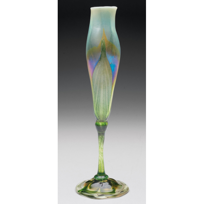 Appraisal: L C Tiffany vase floriform with a green pulled feather