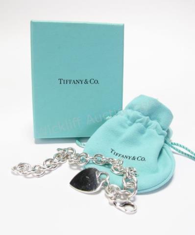 Appraisal: A sterling silver Tiffany Co heart tag charm bracelet with