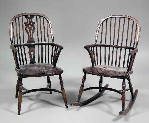 Appraisal: A modern miniature wooden stick back Windsor armchair with pierced