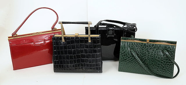 Appraisal: Four s s handbags including a red patent bag with