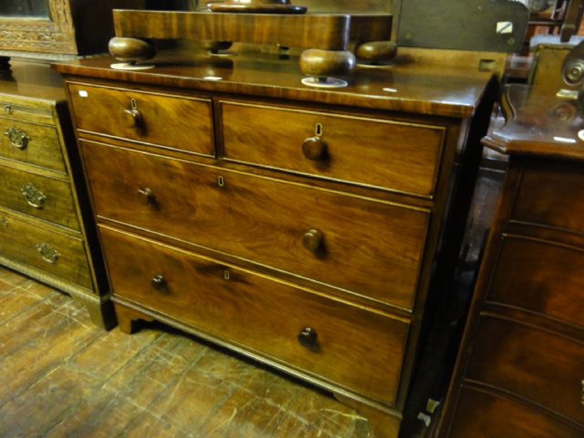 Appraisal: A mid Victorian mahogany chest of two long and two